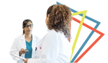Two doctors discussing PEMAZYRE's mechanism of action